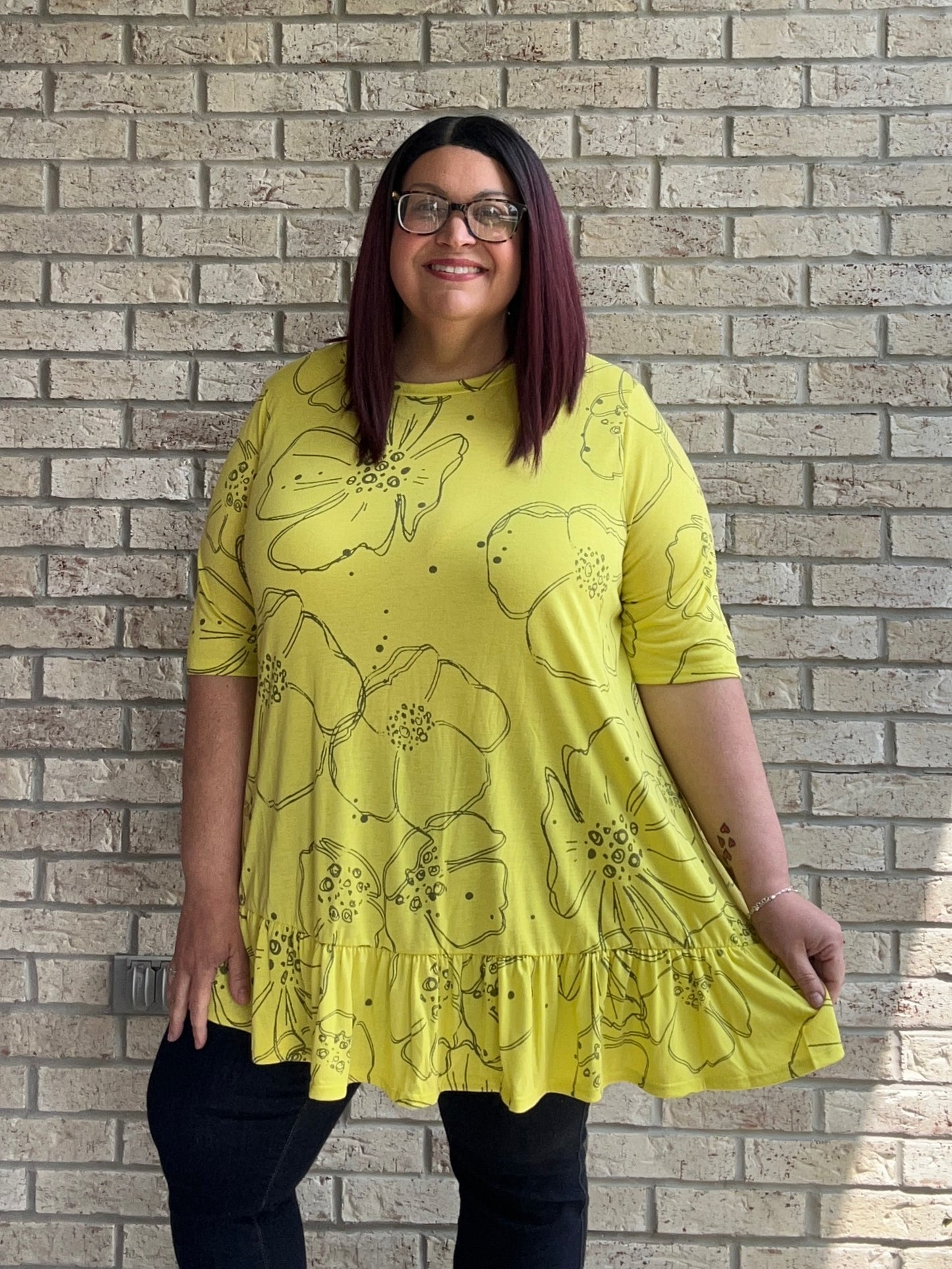 Tonya lime green floral print ruffle bottom top
