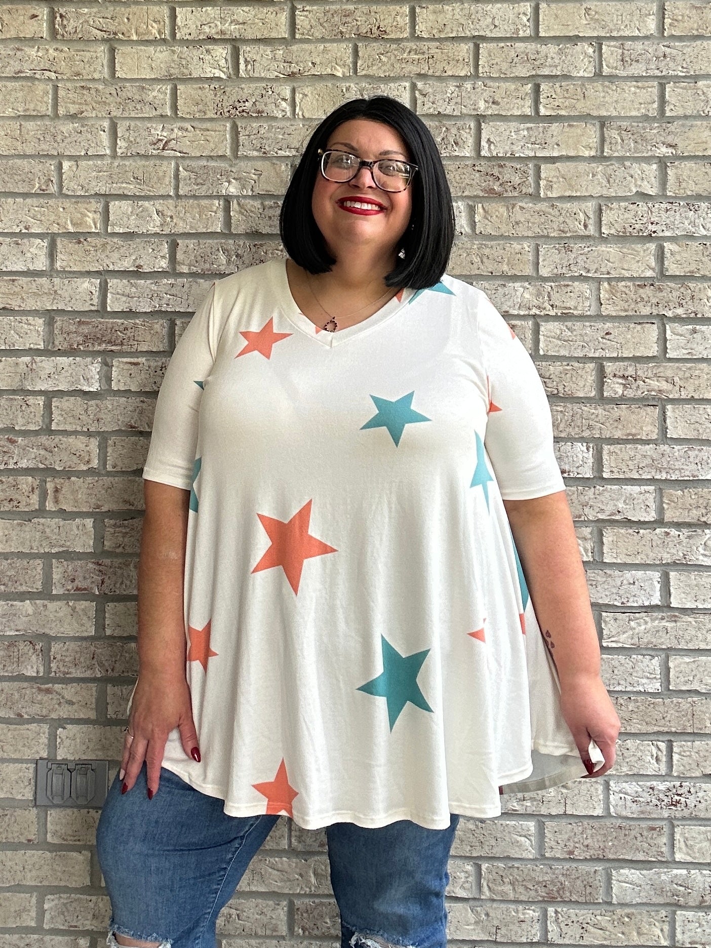 Claudia ivory star print swing top